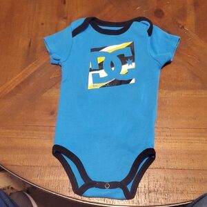 🐻    DC Shoes Blue and Black Bodysuit with Logo